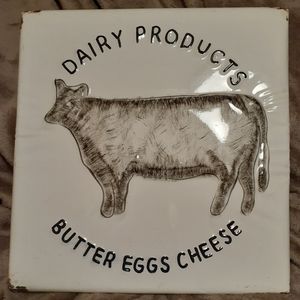 Metal Dairy sign with cow